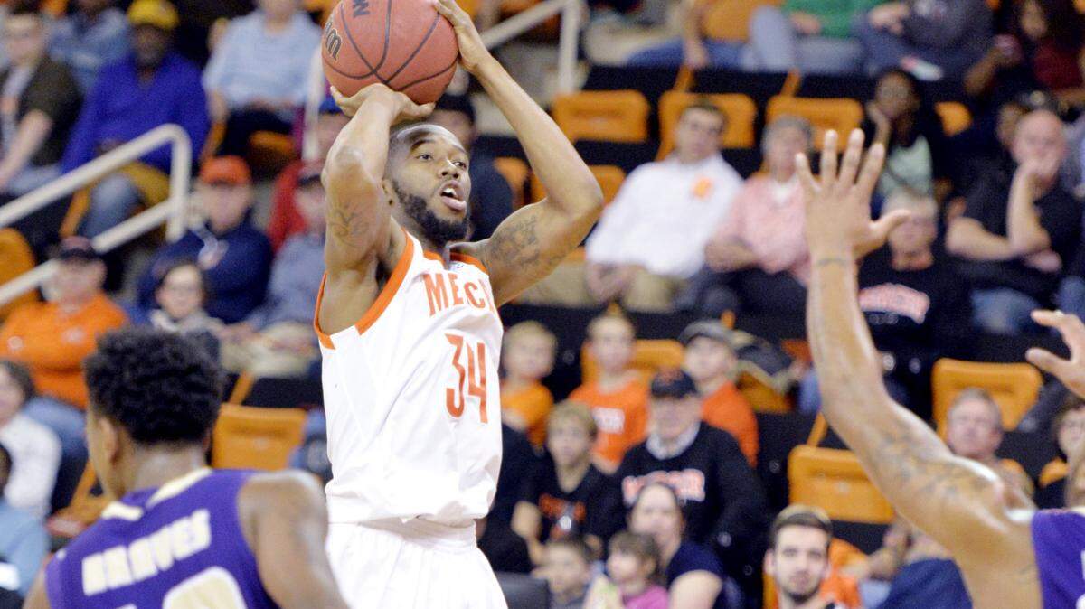 Mercer guard Jibri Bryan (34) puts up a 4-point shot during the Bears' win Saturday over Alcorn State.