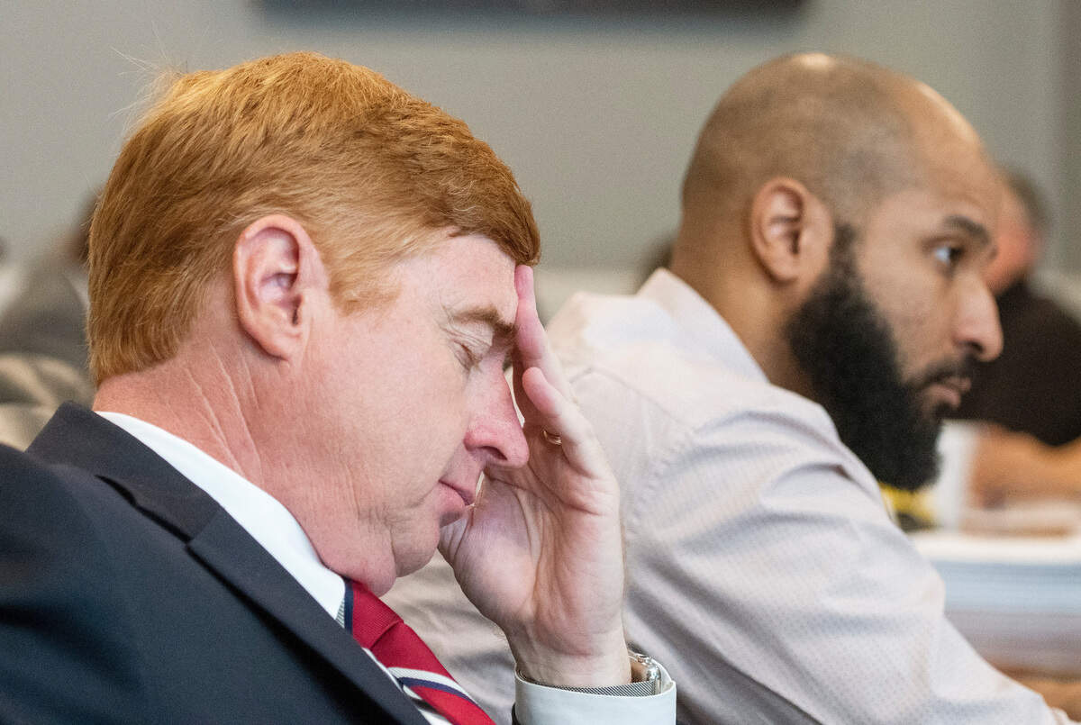 County attorney Judd Drake rests his hand on his head while closing his eyes during a committee meeting to discuss a millage increase Aug. 9 at the Macon-Bibb Government Center. The committee voted 5-4 on a 3 mil increase that will be voted on in a called commission meeting next week.