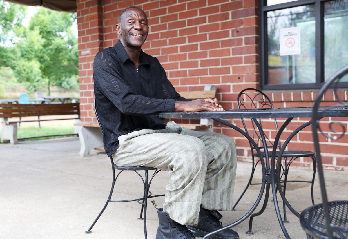 Anthony Leon Andrews poses for a portrait in the courtyard outside of Daybreak on Friday, June 28, 2024, in Macon, Georgia. This is the first summer Andrews has been unhoused and is using resources like Daybreak to deal with high temperatures in Macon.