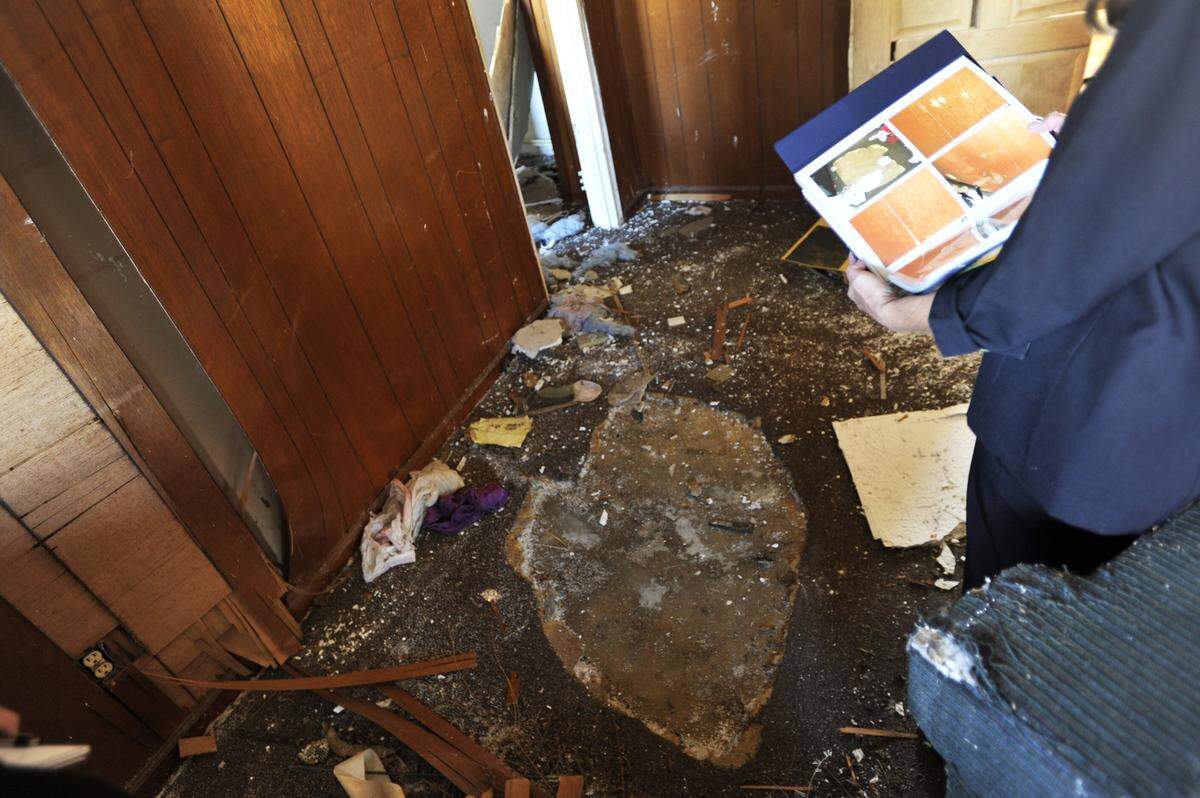 Whoever killed Shorty may have cut out the piece of carpet where he bled in an abandoned apartment.