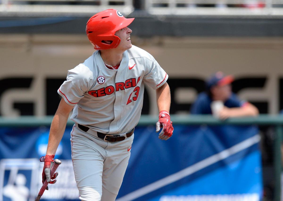 Georgia’s Conner Tate (23) watches his 3-run home run in the top of the fourth inning of the Bulldogs’ NCAA regional game against Florida Atlantic Sunday in Athens.
