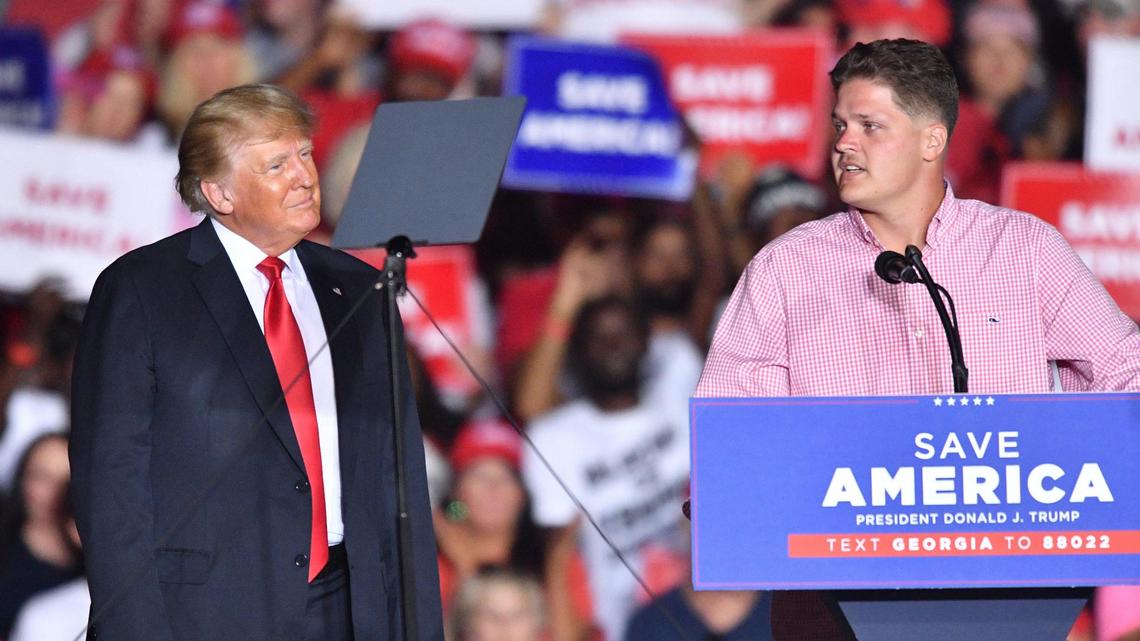 DONN RODENROTH,Macon, Georgia, 09/25/2021: Donald Trump in Perry Georgia with local service member.