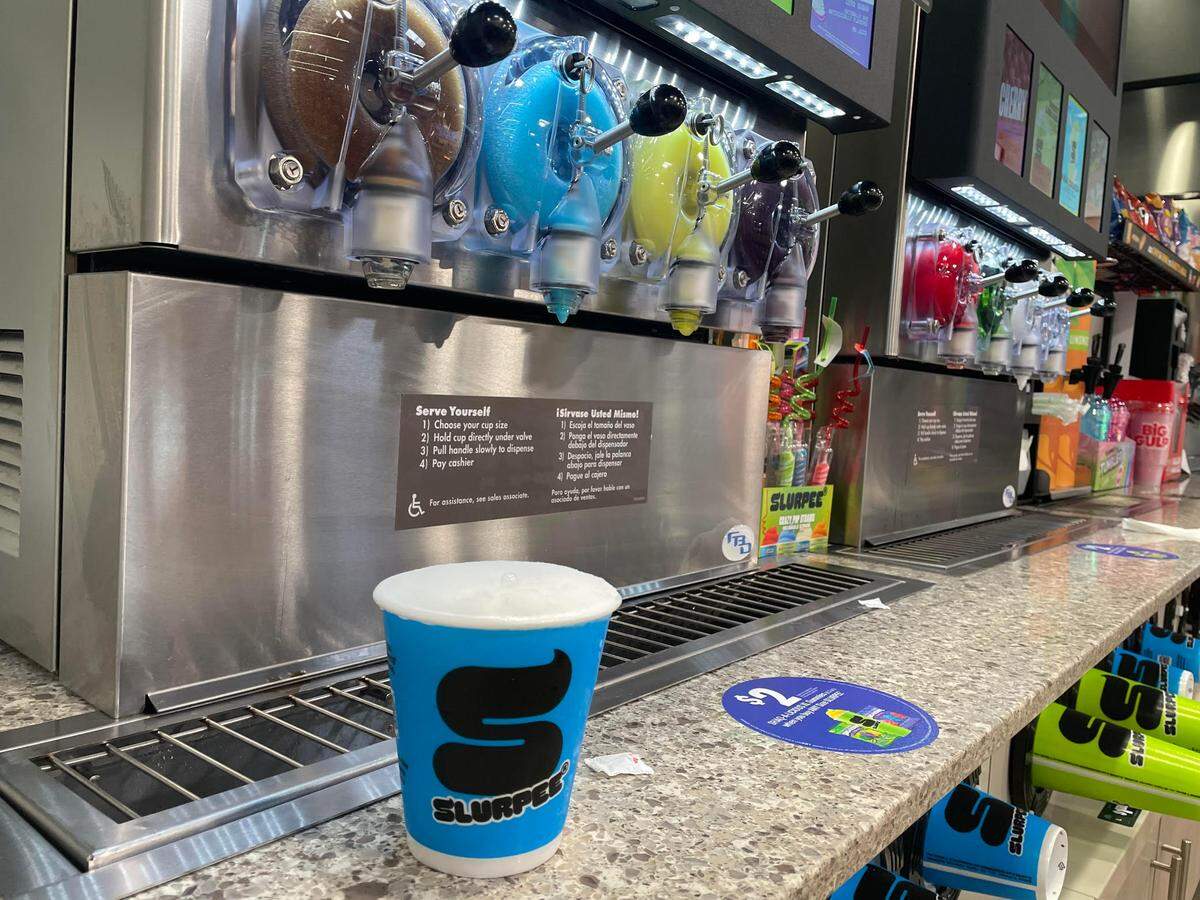 With the new Raise the Roost Chicken & Biscuits inside a Speedway owned by 7-Eleven in Warner Robins, customers can also grab an iconic slurpee such as a small pina colada slurpee shown here.