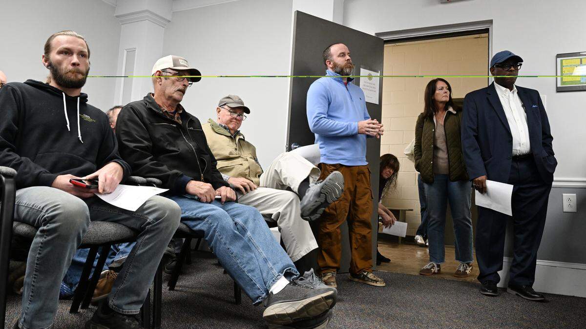 Attendees pack into the meeting room for a called meeting by the Jones County Board of Commissioners on a text amendment to allow for data centers on Friday, Jan. 16, 2026, at the Jones County Government Center in Gray, Georgia. The board of commissioners unanimously passed the text amendment that would allow data centers with conditional use in industrial zones.