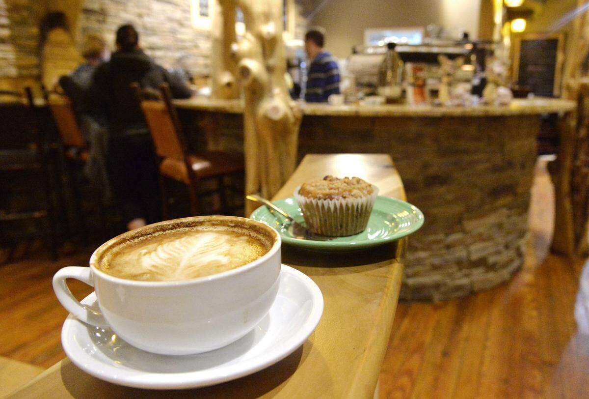 Small latte and blueberry muffin at Taste & See Coffee Shop & Gallery in downtown Macon. The popular spot is reopening after nearly-a-year hiatus.