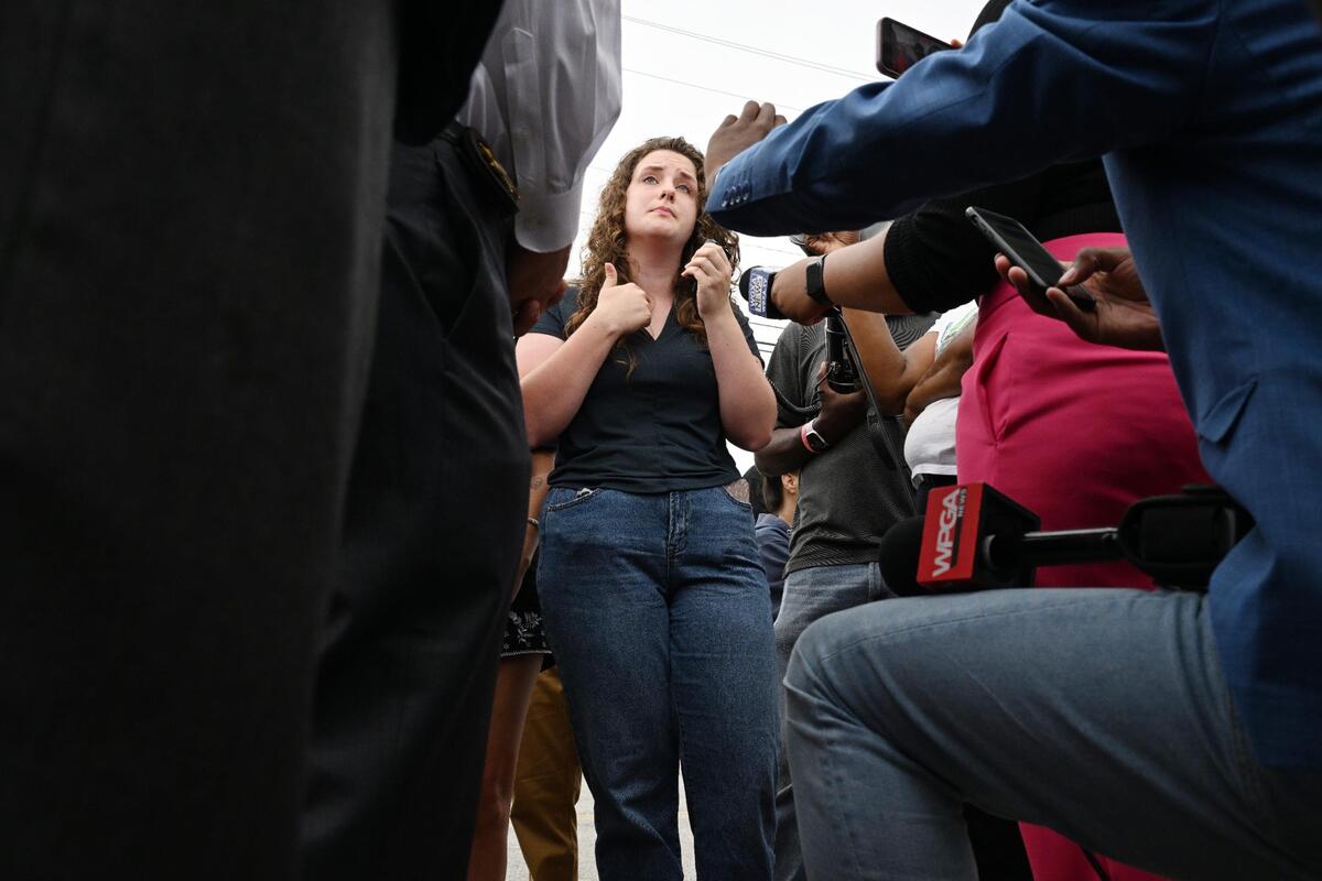 Macon resident Arden Latham speaks to Bibb County Sheriff David Davis during a protest on Bibb County Jail conditions on Wednesday, May 28, 2025, outside of the Bibb County Sheriff’s Office in Macon, Georgia. Latham shared her experience when she was arrested and kept in the Bibb County Jail for a night in December 2023.