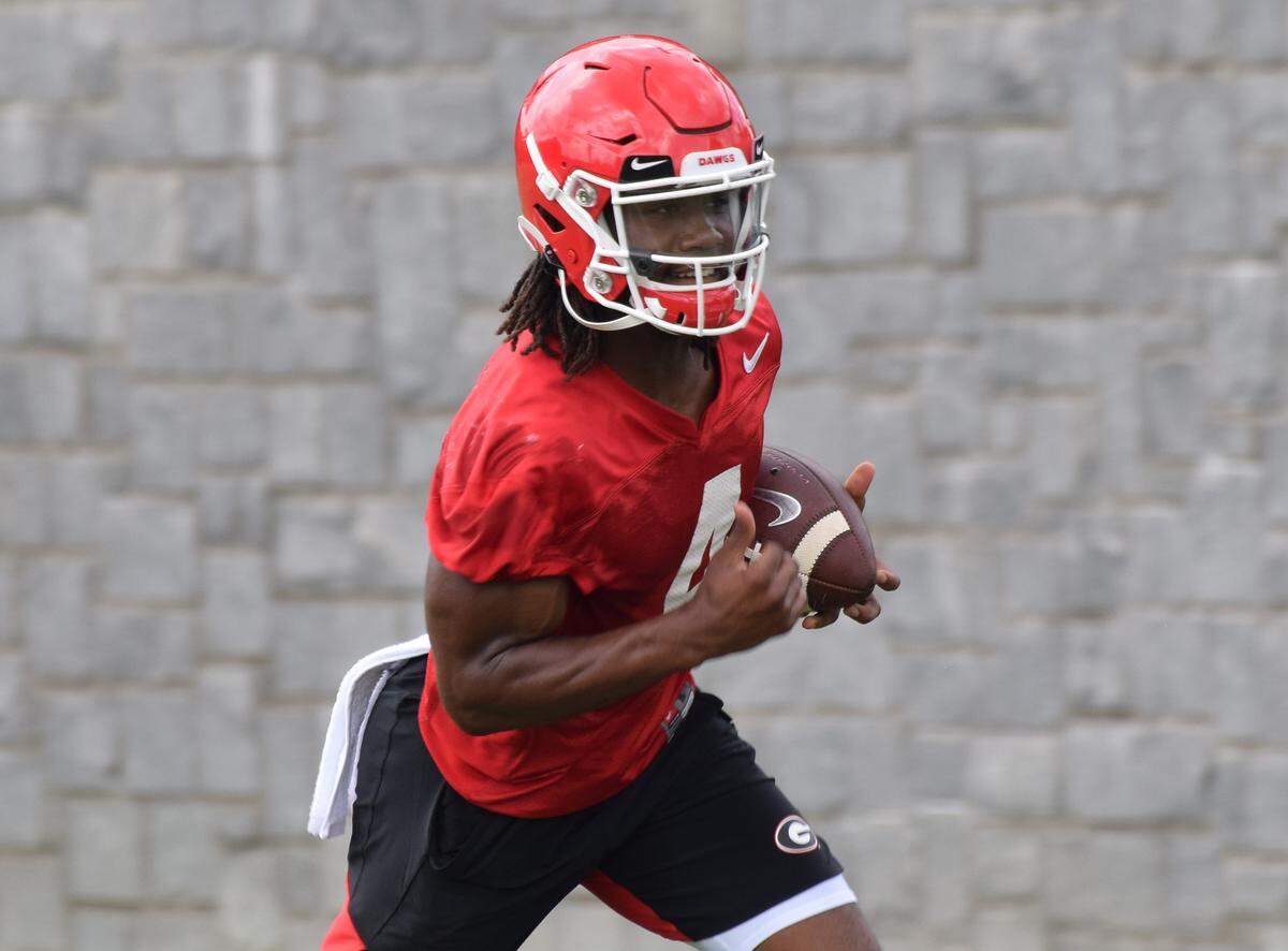 Georgia tailback James Cook (4) during the Bulldogs’ session on the Woodruff Practice Fields in Athens, Ga., on Friday, Aug. 2, 2019.