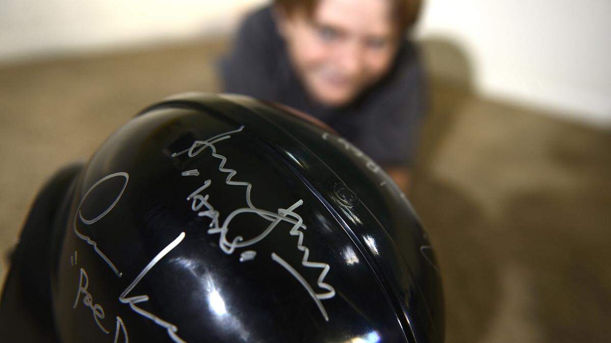 Jeff Gritchen/Orange County RegisterActor Max Page, 11, shows off Harrison Ford's signature on a Darth Vader helmet that's full of Star Wars autographs. Page was the darling of the 2011 Super Bowl when he played mini Darth Vader in a Volkswagen commercial.