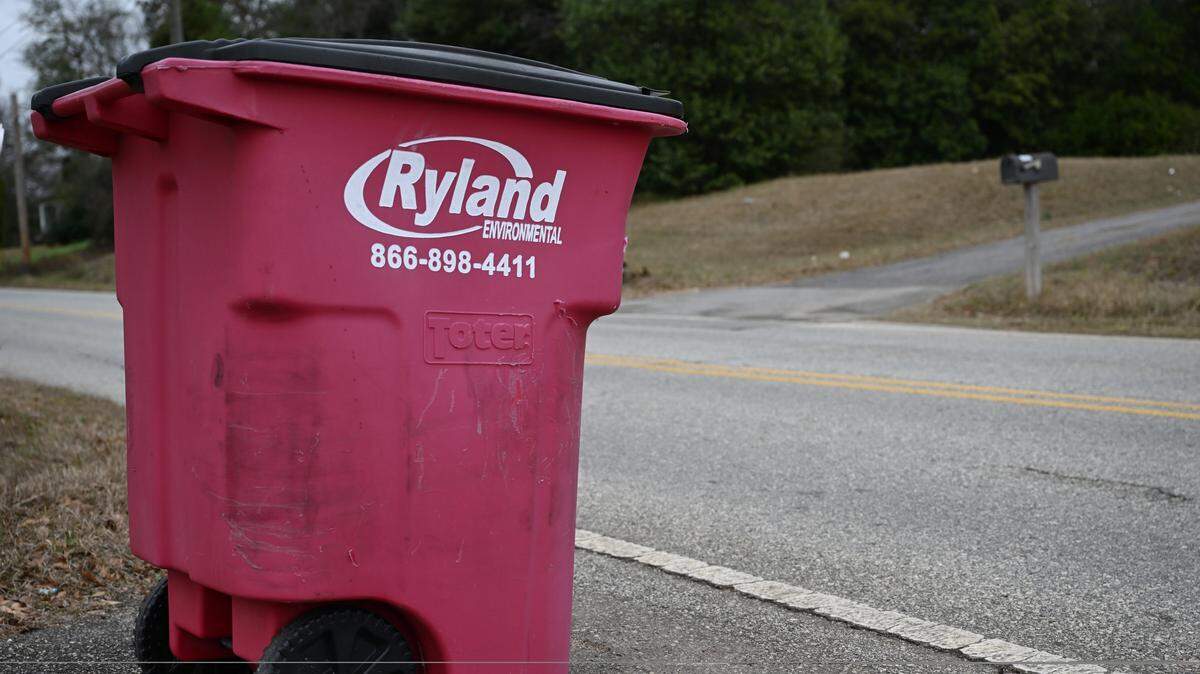 A Ryland Environmental trash can sits on the edge of Hazel Street in Macon, Georgia. OSHA has launched an investigation into the detah of a Ryland worker. 