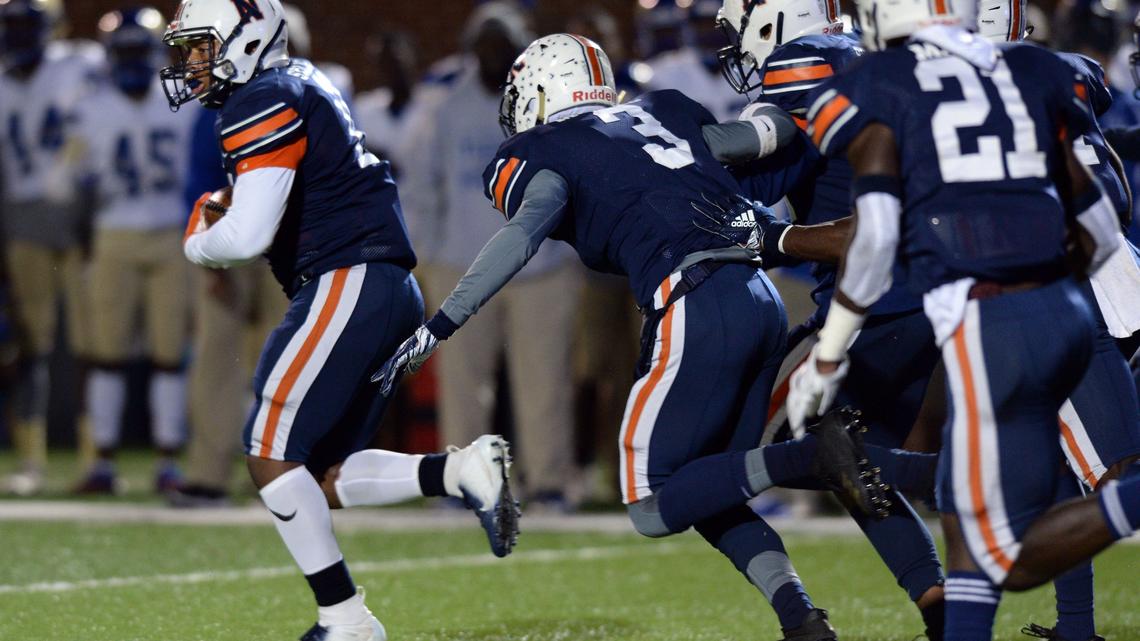 Northside’s Mario Starling (11) picks up a mishandled Bradwell Institute snap and returns the fumble return 70-yards during the second quarter in this Telegraph file photo. The defensive play set up a touchdown run by Northside’s Zikhyree Hill two plays later.