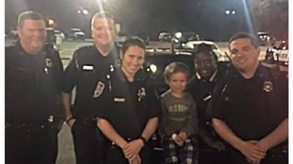 Special to The Telegraph 
 Five Milledgeville police officers visited 5-year-old Gage Aldrich who was sick with the flu early Monday morning at Oconee Regional Medical Center.
