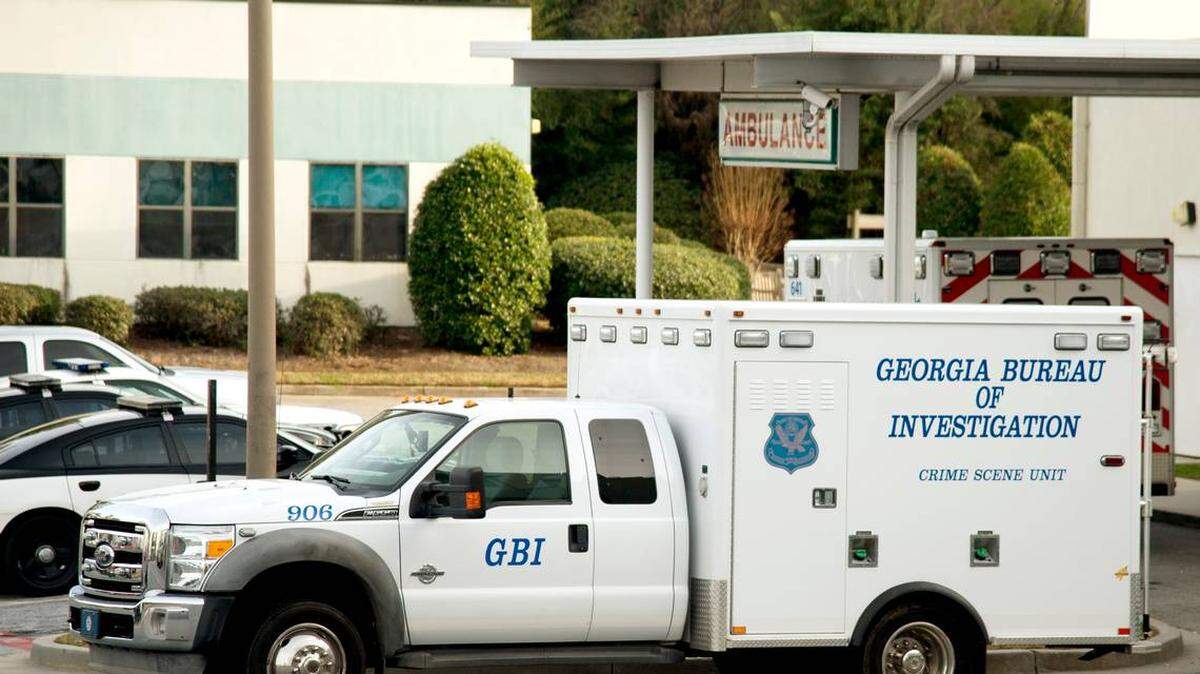 A GBI investigator truck is parked outside Navicent Health Baldwin where a Navicent Health police officer shot a man inside the hospital Tuesday afternoon.