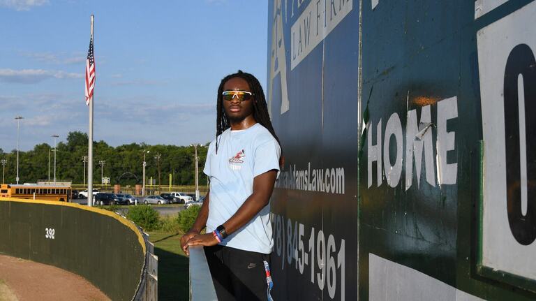 This college student braves Georgia heat to operate Macon Bacon’s old-school scoreboard