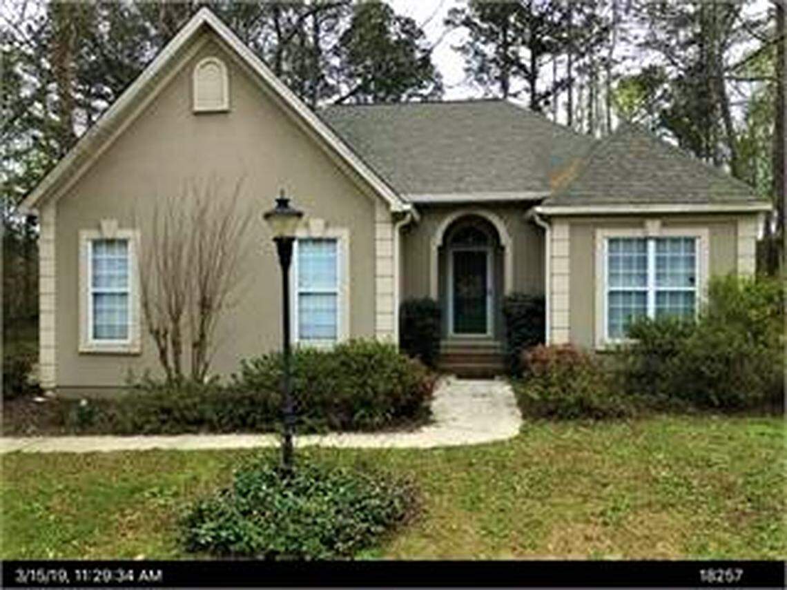The home at 309 Winchester Place in the Barrington Hall subdivision where Cynthia L. Berry lived and was found slain early Monday.
