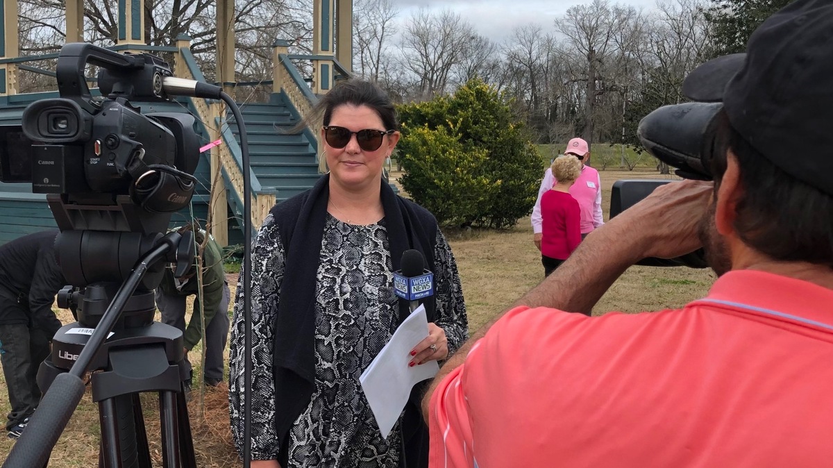 Keep Macon-Bibb Beautiful Executive Director Caroline Childs addresses the media Thursday during an early Arbor Day celebration at Carolyn Crayton Park. Childs will leave her post at the end of February.