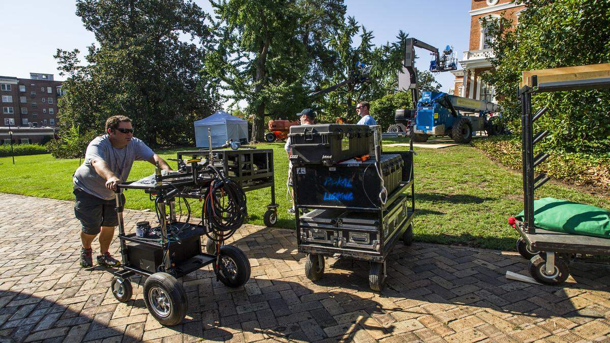 A production crew works on the Hay House grounds Wednesday morning.