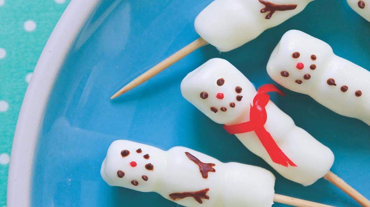 Small desserts that pack a big punch include Mini Marshmallow Snowmen.