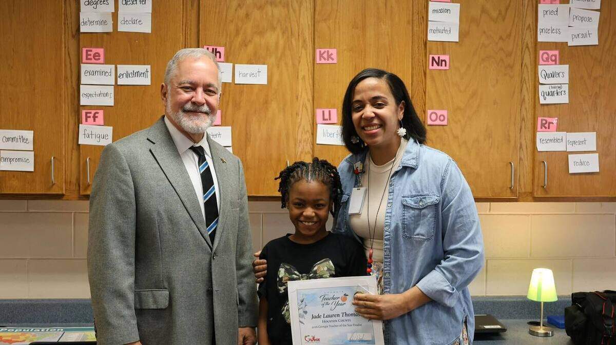 Georgia Superintendent Richard Woods informs Houston County elementary school teacher Jade Thomas with news that she has been selected as one of the state’s ten finalists for 2026 Teacher of the Year Award. Thomas teaches fourth grade at Lake Joy Elementary.
