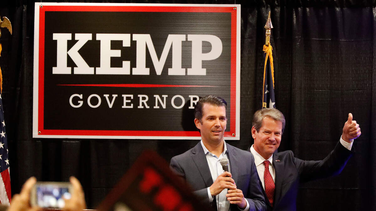 Donald Trump Jr. speaks to the crowd during a campaign event of Republican nominee for Georgia Gov. Brian Kemp, right, Oct. 9 in Athens.