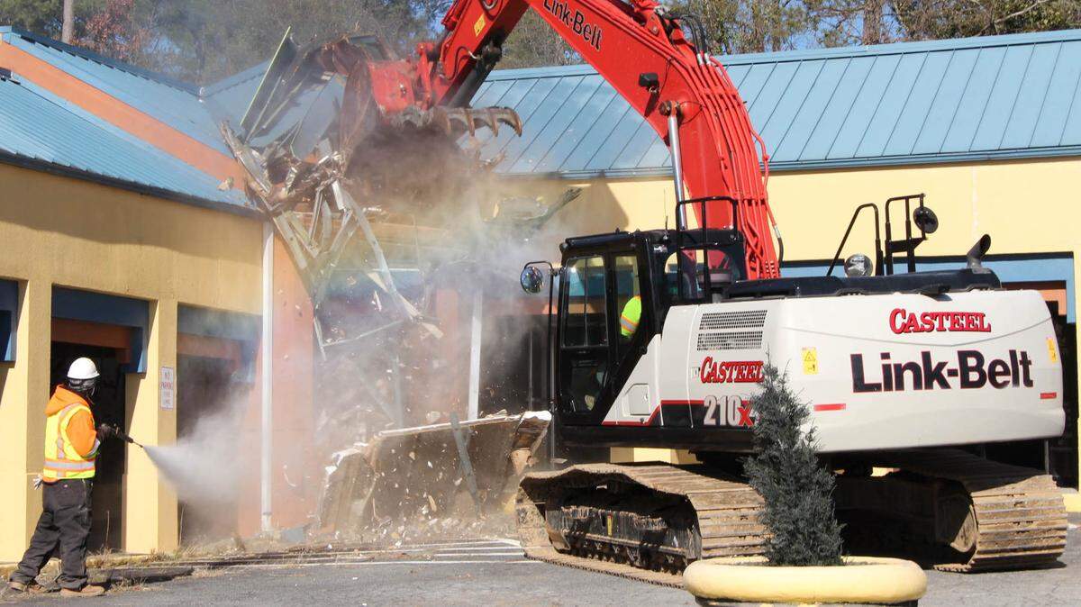Demolition of the old Riverside Plaza took place Wednesday in Macon to begin construction of the new River Edge Behavioral Health Complex.