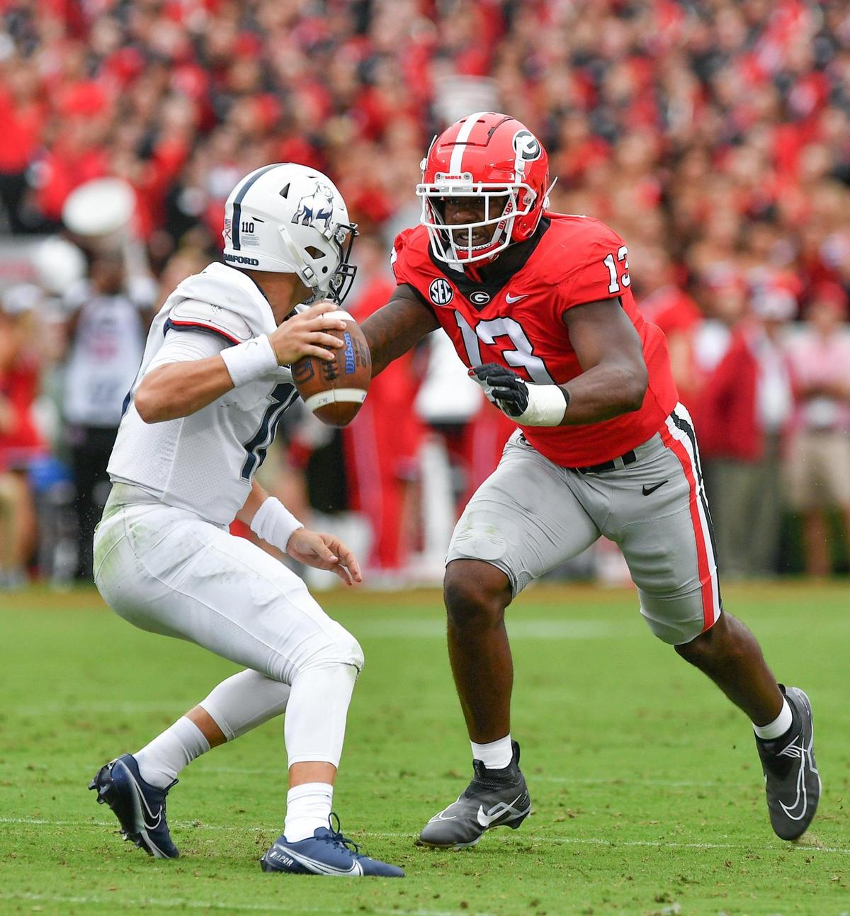 Mykel Williams pressures quarterback Michael Hiers 1st half action