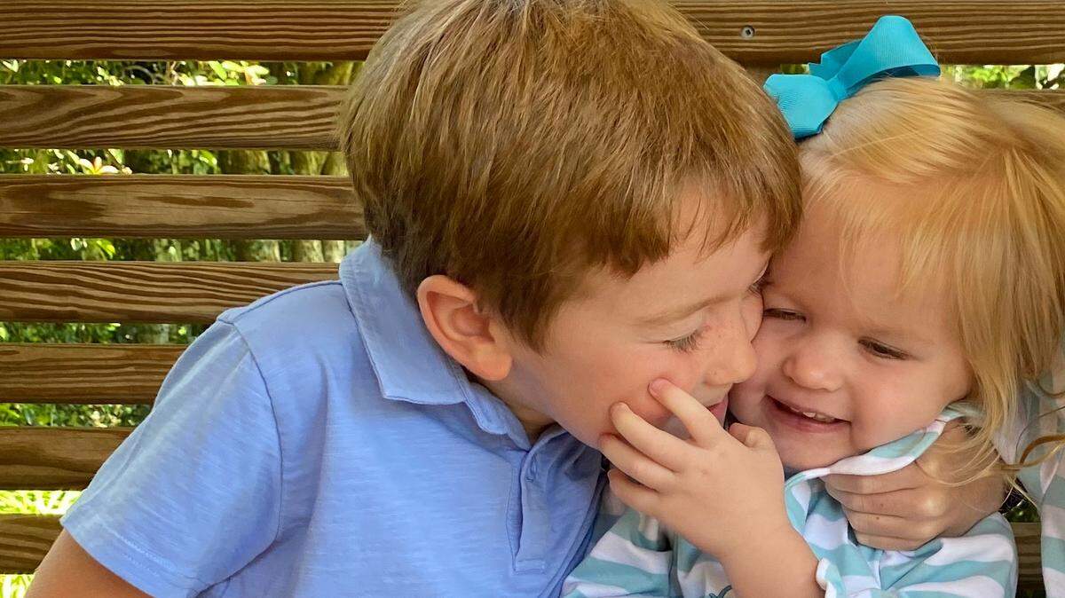 From left: Brewer Grisamore and Ginny Pope Grisamore. We could all use a hug right now, writes their grandfather and Telegraph columnist Ed Grisamore.