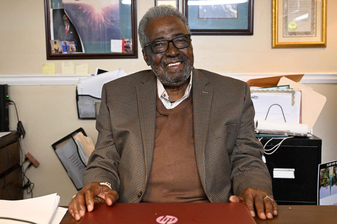 Macon-Middle Georgia Black Pages founder and publisher Alex Habersham sits behind his office desk at the publication’s office on Tuesday, Feb. 24, 2026, in Macon, Georgia. Habersham started the Black Pages in 1991, a resource guide of Black owned establishments across Middle Georgia.