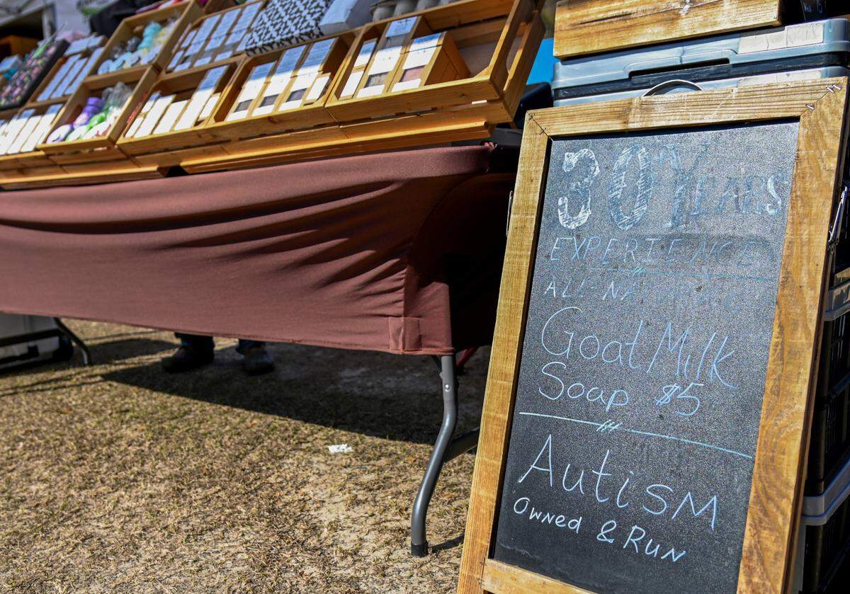 The Sassy Alpaca booth at the International City Farmer’s Market Thursday in Warner Robins.