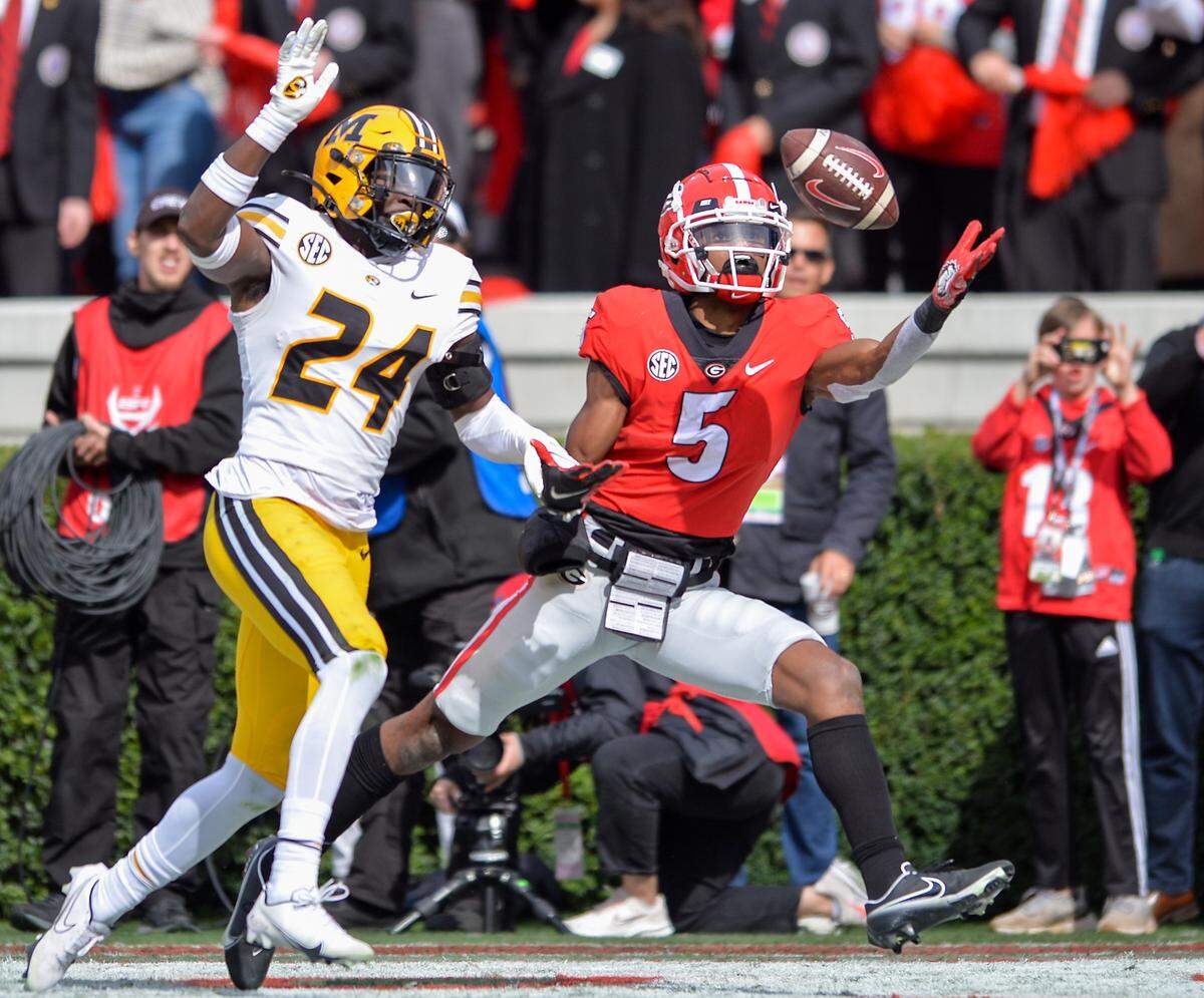 Georgia wide receiver Adonai Mitchell tries to haul is pass in the end zone Saturday against Missouri.