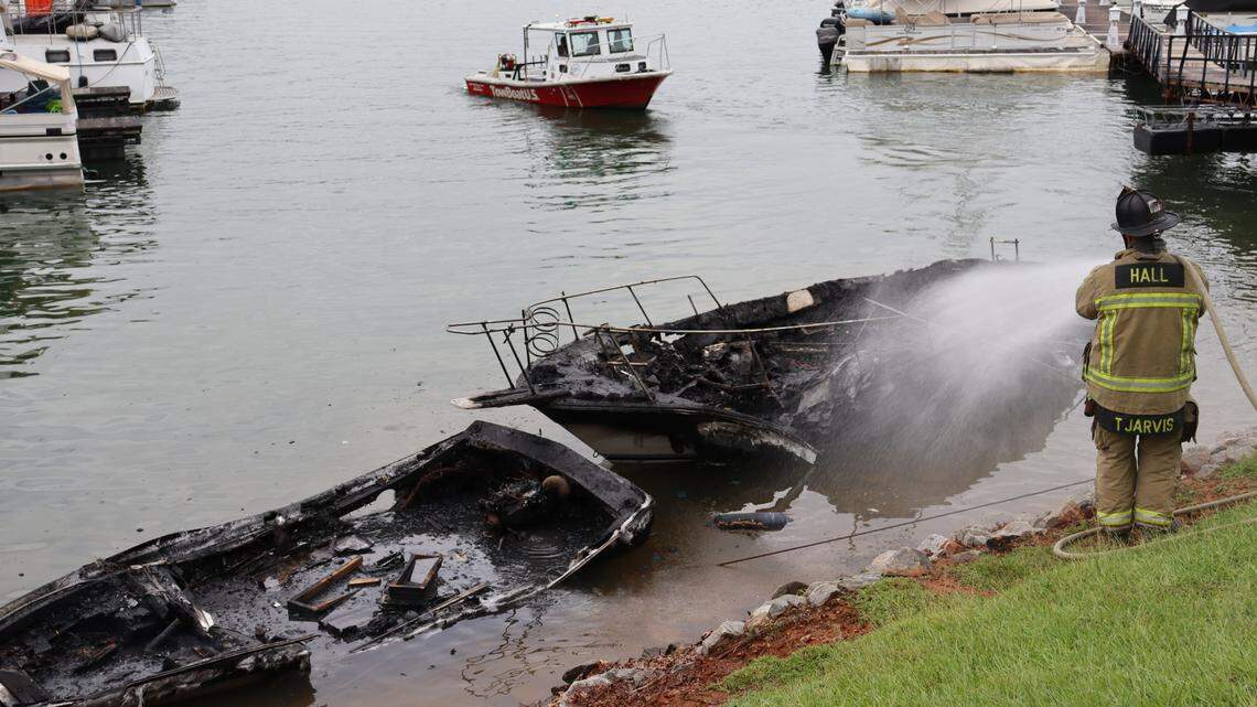 Firefighters extinguished a massive fire that destroyed three boats at a Georgia marina.