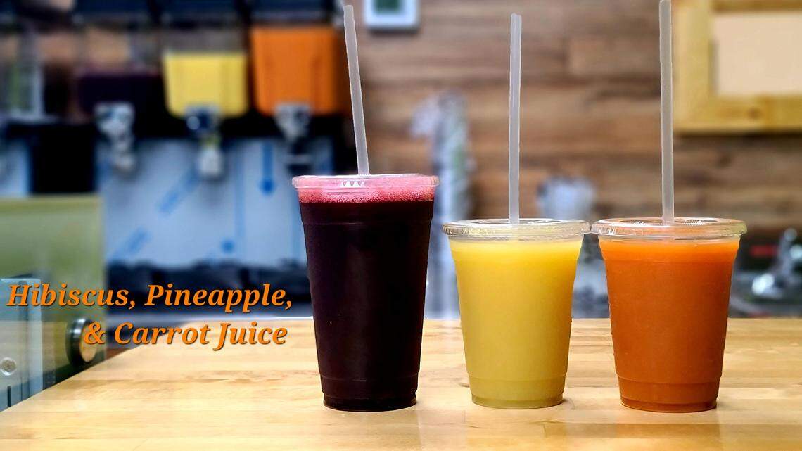 Hibiscus, pineapple and carrot juice at Roots Plant Based Cafe in Byron.