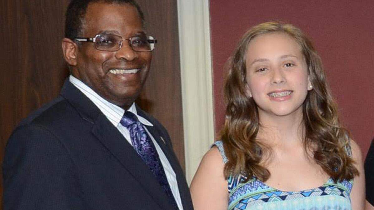 Helen O'Dell, right, was honored for her science fair efforts. She is pictured with Bibb County school Superintendent Curtis Jones.