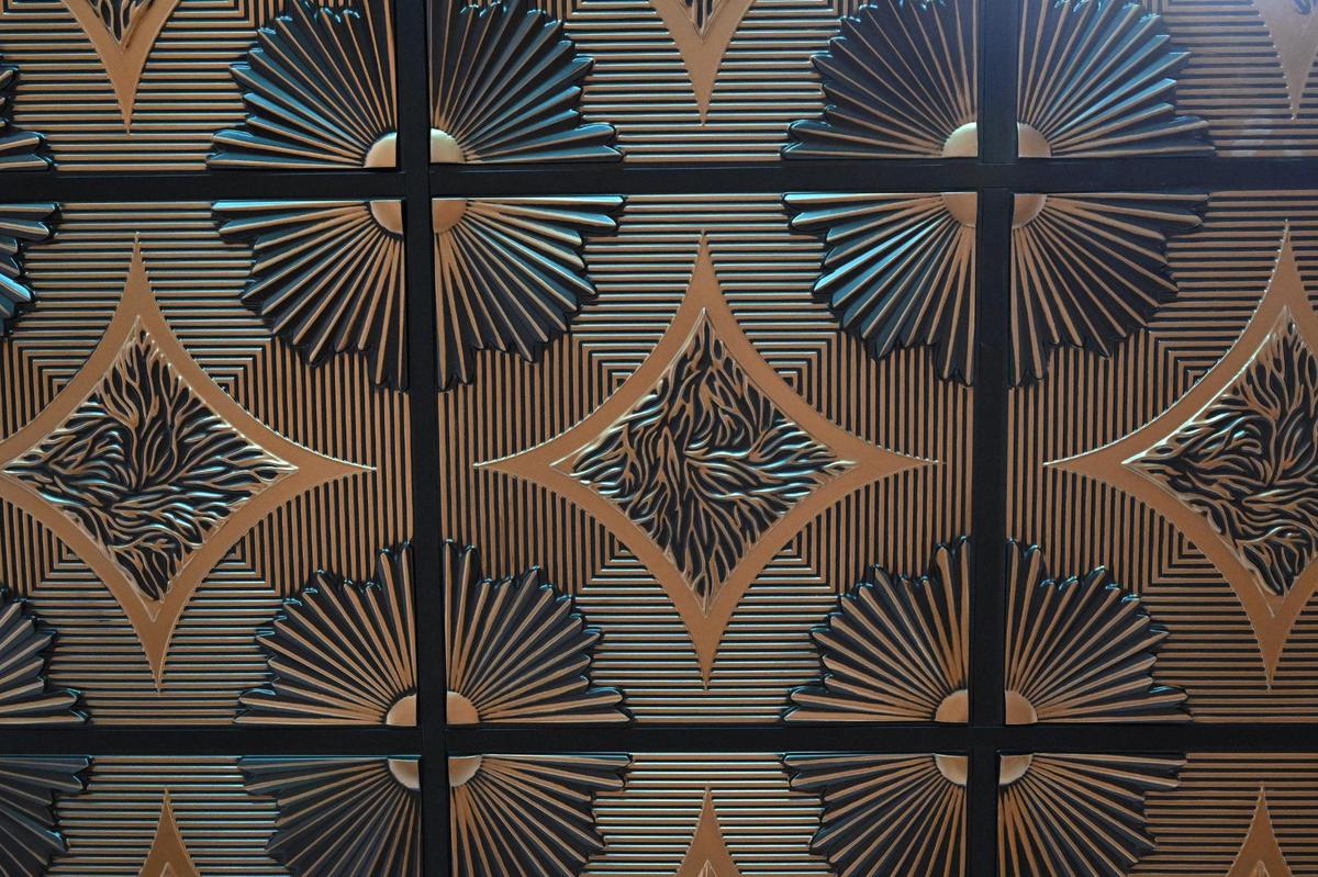 New ceiling tiles sit in the lobby of the Rose Theater the week of its grand re-opening on Monday, June 16, 2025, in Forsyth, Georgia. The Backlot Players took the opportunity to add additional renovations to the space outside of what was damaged in the fire, including upgrading the lobby.