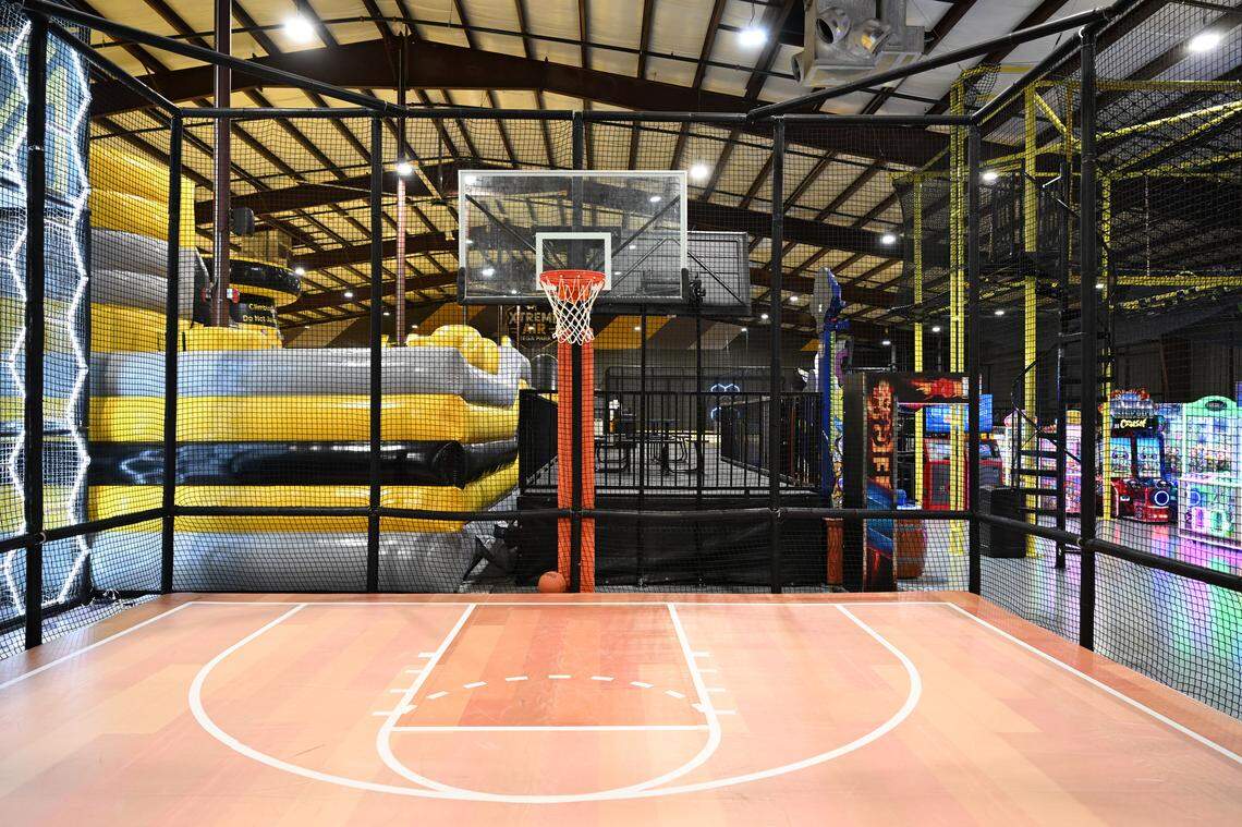 An air track drunk court allows guests to play basketball on a trampoline-like court at the new Xtreme Air Mega Park in Warner Robins. A smaller court for kids 55 inches and below is nearby.