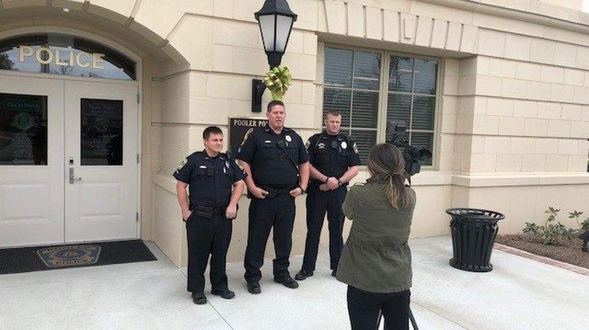 Pooler police officers are interviewed by WSAV-TV's Stassy Olmos about helping a mother and her 8-year-old boy found sleeping in a car behind Lowe's on Christmas Eve. Her story is expected to air Thursday night, the police agency posted on Facebook.