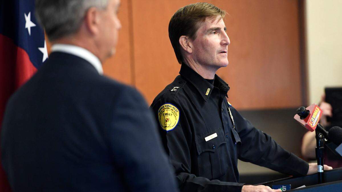 Then-Warner Robins Police Chief Brett Evans talks to the gathered media at the Law Enforcement Center in January 2018.