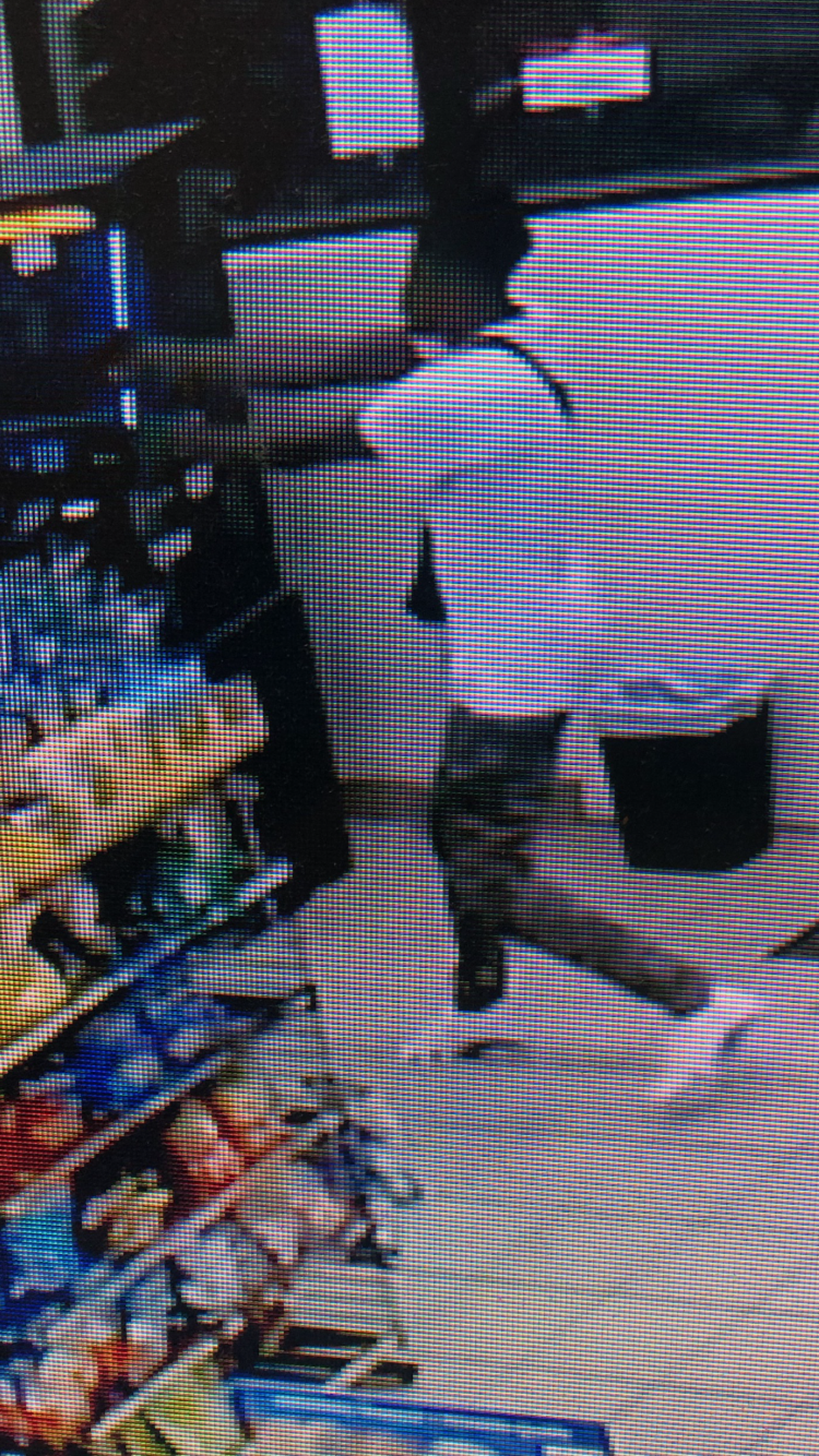 A surveillance camera captured images of an alleged suspect wanted in the shooting death of a Macon man Sunday night inside an Emery Highway gas mart.