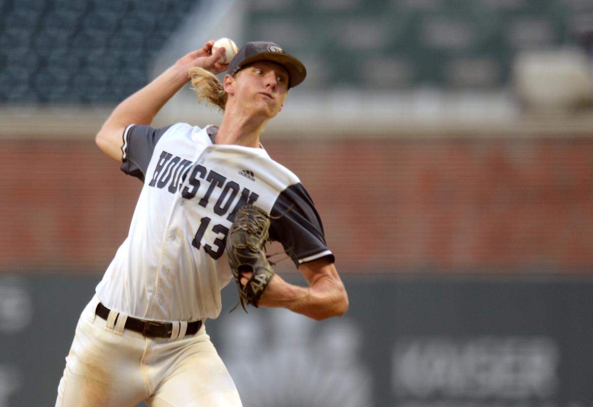 Houston County pitcher Coleman Willis (13) delivers a pitch to the plate during game two of the BearsÕ GHSA 6A Championship series against Lassiter Wednesday in Atlanta.