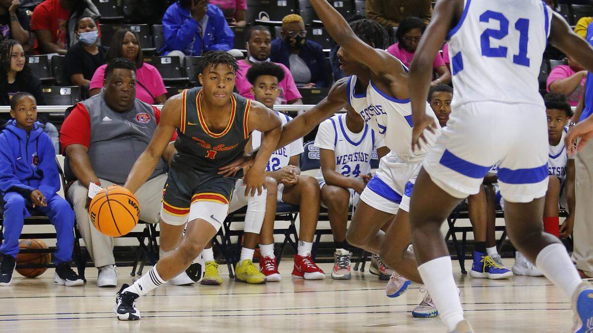 Northeast guard Travion Solomon (1) drives past the defense during the Raiders’ 73-55 loss to Westside-Augusta in the GHSA 2A semifinal.