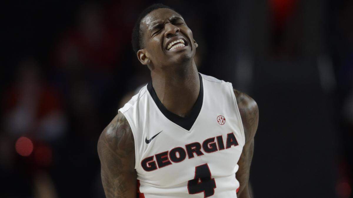 Georgia guard Tyree Crump reacts after sinking a shot in the first of Tuesday's win over Florida.