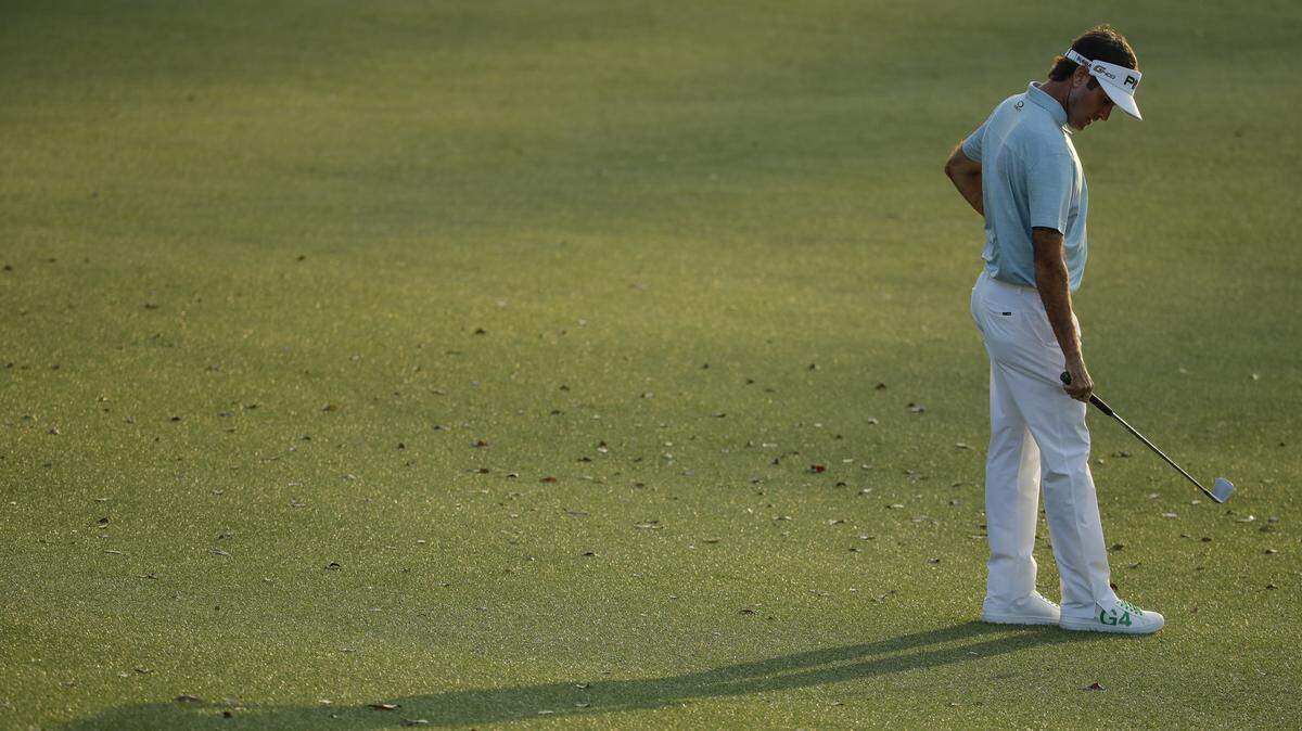 Bubba Watson pauses on the 18th hole during the second round at the Masters golf tournament Friday.