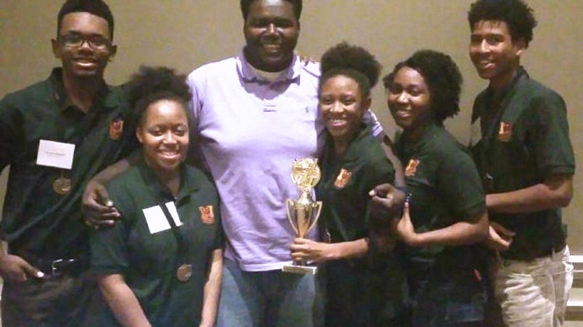 Mercer University Upward Bound's Scholar's Bowl team brought home the first-place trophy from the 2015 Student Leadership Conference, sponsored by the state TRIO professional association, the Georgia Association of Special Programs Personnel. (Submitted)