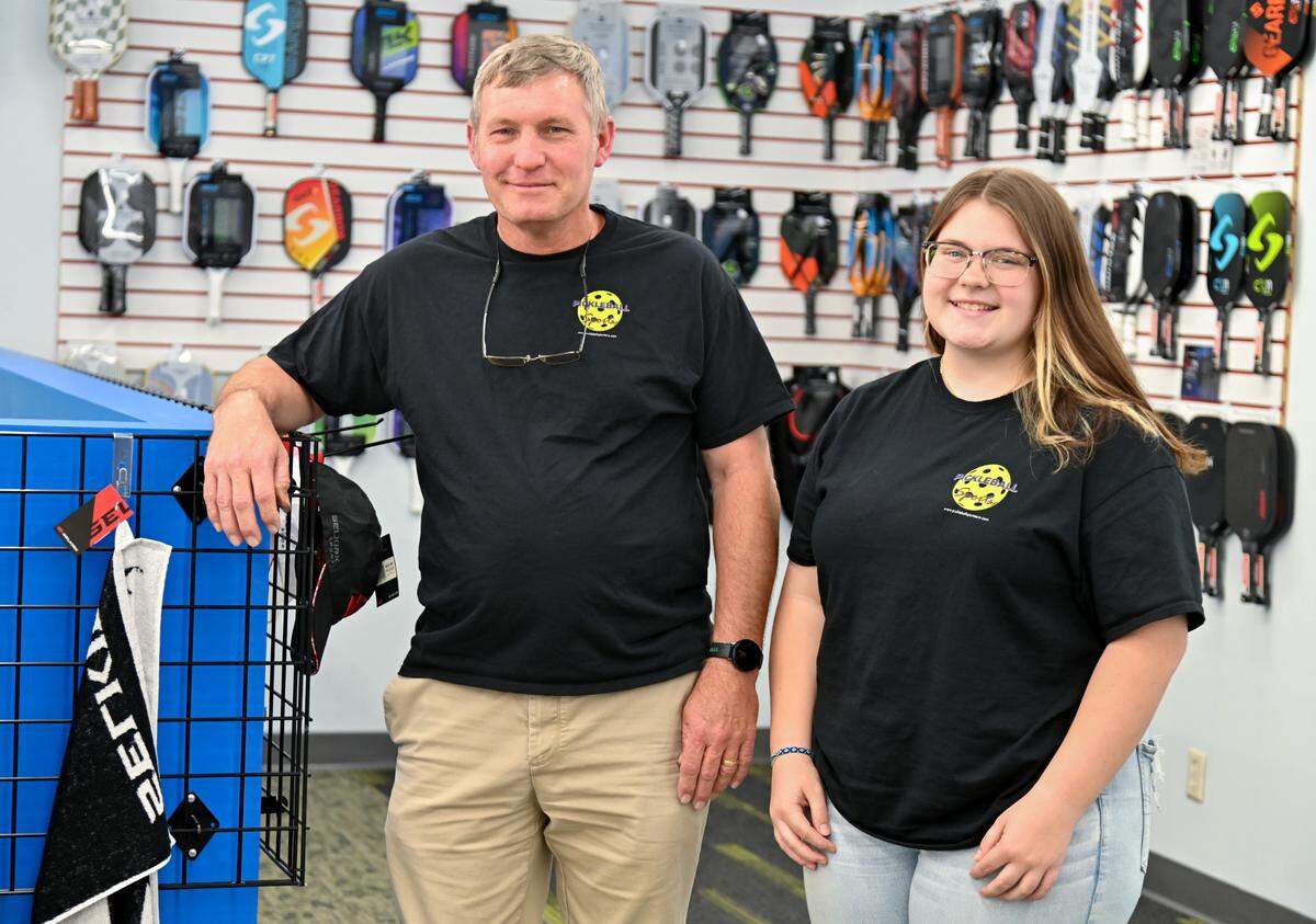 Owner Greg Stokes and his daughter Brayden Stokes at Pickleball Sports at 4446 Forsyth Road in Macon.
