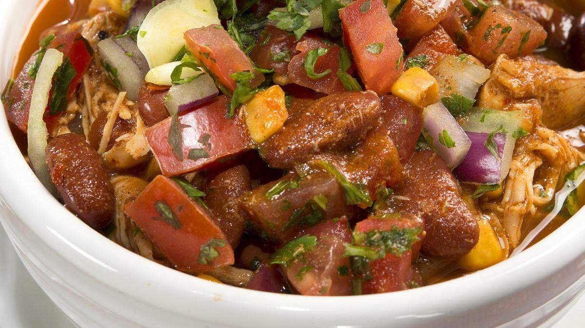 Marissa Allen's Game Day Chicken Chili is topped with pico de gallo.