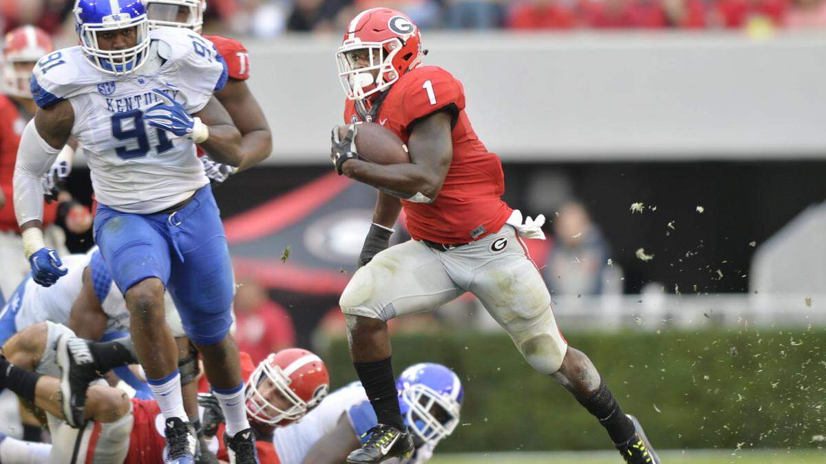 Georgia running back Sony Michel (1) cuts back inside, his longest rush for the day against Kentucky--45 yards-- in the third quarter. Georgia beat Kentucky, 27-3.