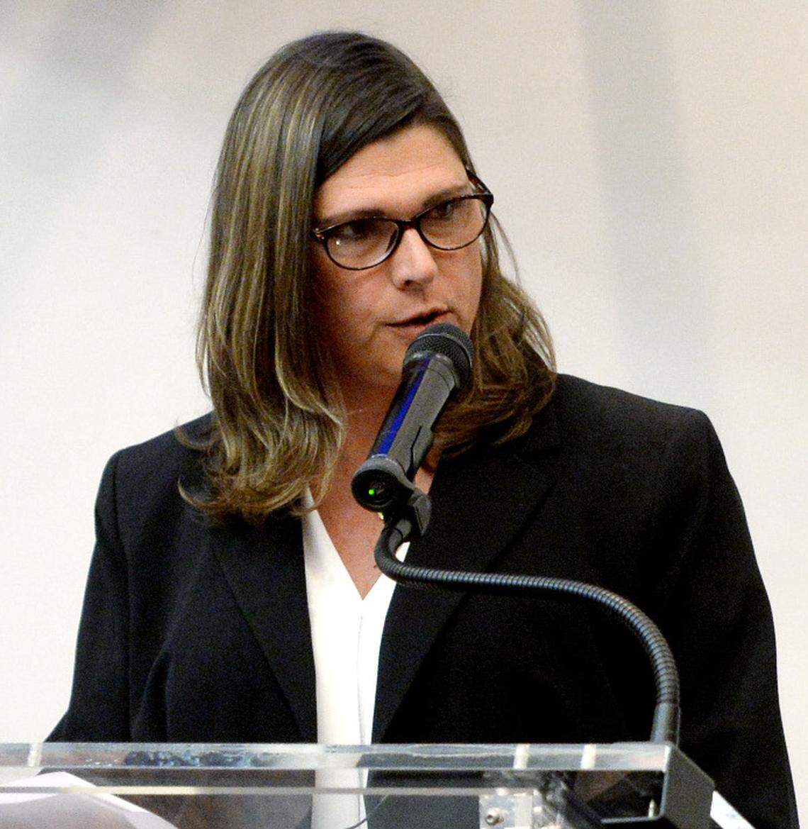 Anna Lange, a transgender Houston County Sheriff’s Office criminal investigator, addressing Houston County commissioners at a meeting in February.