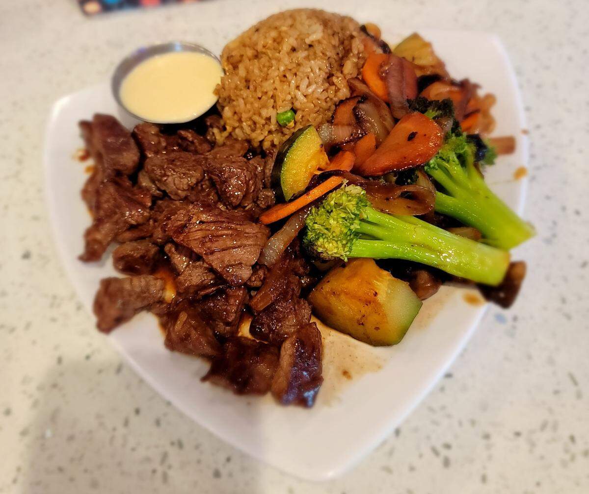 Filet hibachi with vegetables and fried rice.