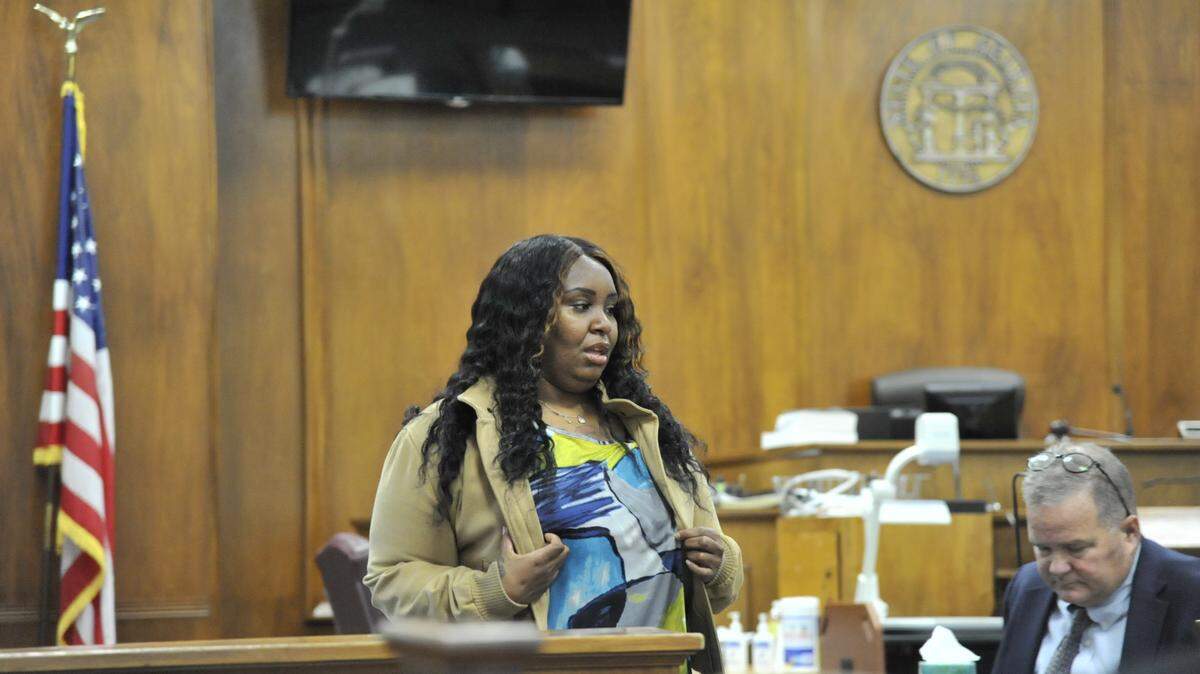 Brandi Nicole Dixon, accused of murder in the July 2018 stabbing death of Ebony Monique Smith, in Bibb County Superior Court during the first day of testimony in her trial on Tuesday, March 29, 2022.