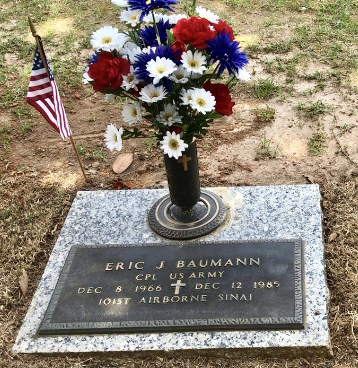 Army Cpl. Eric Joseph Baumann’s grave marker at Magnolia Park Cemetery in Warner Robins.