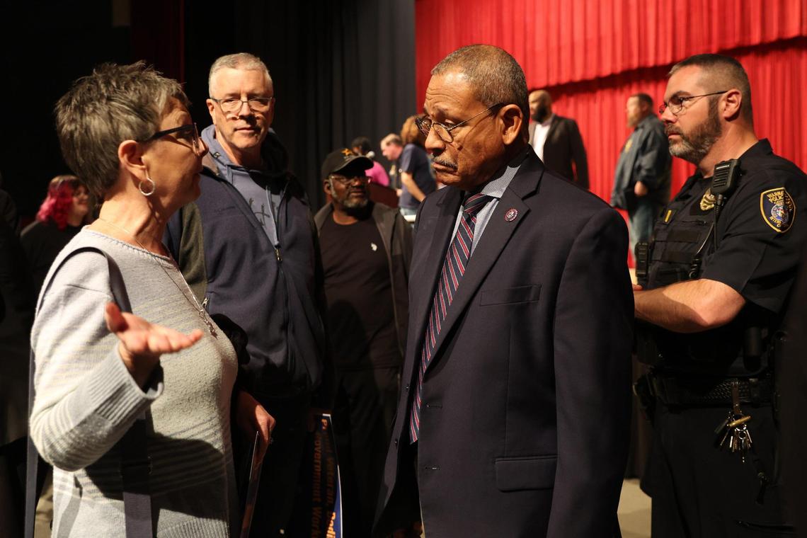 Rep. Sanford Bishop (D-GA), right, listens to Julie Savoy, from Kathleen, Georgia, after the conclusion of the town hall hosted by the local chapter of the American Federation of Government Employees (AFGE) on Thursday, March 20, 2025, at the Homer J. Walker Civic Center in Warner Robins, Georgia. Savoy lives in the district represented by Rep. Austin Scott (R-GA), who was invited to the town hall but did not attend.